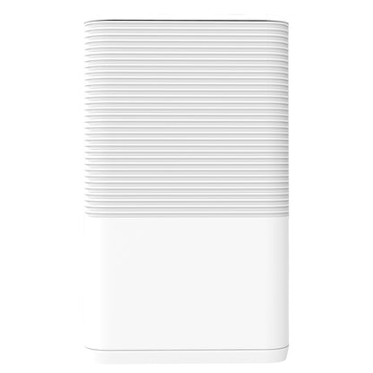 White cylindrical dehumidifier on a white background